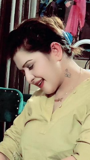 Meaning Behind the Neck Tattoo with ECG Line and Love