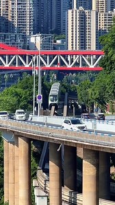 215K views · 1.5K reactions | Chongqing's magic lies in its unique urban design: the monorail transit runs above, while life below remains leisurely and relaxed.  It's a perfect blend of modernity and tranquility! #Chongqing #Cityscape #Urban #Life #Magical #City #Amazing | iChongqing | Facebook