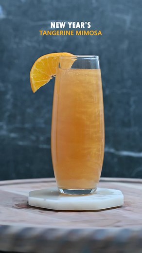 New Year’s Tangerine Mimosa is an amazing and delicious cocktail, perfect for New Year’s Eve! ✨🥂 Add golden edible glitter for more festive effects. Recipe: Freeze tangerine juice into spheres and roll them in edible glitter. 🍊✨ Drop them in the champagne glass and garnish with a tangerine slice. 🍹🍊 Cheers to the New Year! 🎉🥳 #HappyNewYear #CheersTo2024 #NewBeginnings #newyear #newyearseve #happynewyear #glitterbomb #edibleglitter #champagne #prosecco #newyearsparty #cocktail #cocktails #c