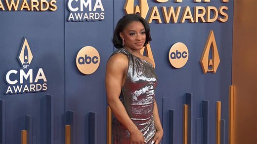 Simone Biles debuts new look as she wows at CMAs