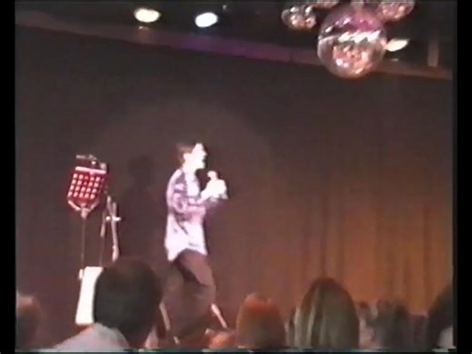Me singing "Play That Funky Music" in the late 90's. Sound and vision quality isn't good, as it was taken on an early phone camera. It was at the Dragonfly Cabaret Restaurant and was the opening of one of my 5 singing school concerts I staged each year to give the kids a chance to perform at a professional venue. The many students were understandably nervous and asked me to sing first to warm the audience up a little. Look out for the cute little girl who happily got up to dance with me as I wal