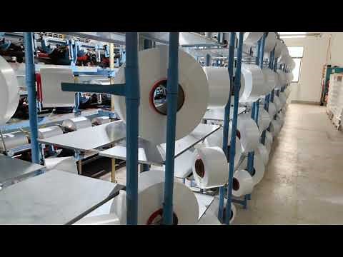 Production process from POY to draw texturing yarn to packaging
