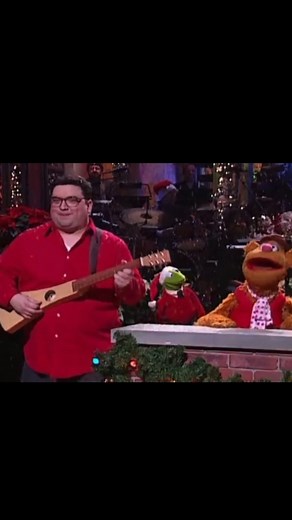 Megan 💚 Muppets Fanatic on Instagram: "Wait for it 🤣THE HAT!! Lol. Kermit is the mood every day until Christmas is here, I’m JUST as excited and can’t stay still! 🎄🤭🎁 I WISH IT WAS CHRISTMAS TODAYYYY! This is from an SNL performance if ya can’t tell, long running bit of doing this song so it was iconic when the Muppets stepped in to do it! Love that Fozzie and Gonzo both had their own parts too. 🥹🎅🏻⛄️❄️ #muppets #themuppets #kermitthefrog #kermit #fozziebear #snlskit"