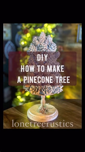 DIY - HOW TO MAKE A PINECONE TREE - Y’all I am in LOVE 😍 with how this whitewashed pinecone tree turned out! So cute and so rustic, yet elegant! This tree can be made with regular pinecones, or be sure to watch the DIY on how to paint pinecones if you want whitewashed look like this one. Thank for watching!! #pinecone #holidayseason #naturelover #christmas #crafting #diy #diyhomedecor #holidaydecor #rustic #farmhouse #hobbylobby | Lone Tree Rustics