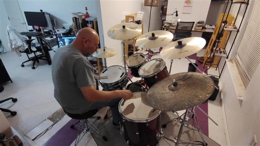 George Strait's Musical Influence and Drumming Techniques