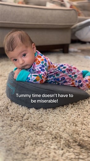 Hi 👋🏼 my name is Holly and I was a pediatric OT before becoming a stay at home mom to 2 littles! Here sharing developmental tips and milestones, toy and play recommendations, my faith, and my daily life ✨ 👶🏻 Tummy time doesn’t have to mean flat on the floor! Using a small wedge, couch cushion, Boppy, or even a rolled-up towel under baby’s chest can make it more comfortable and help them tolerate it longer. That little incline gives them a boost so that lifting their head isn’t quite as hard,