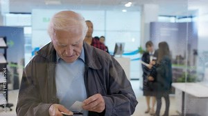 View behind screen of customer in modern bank using interactive atm machine