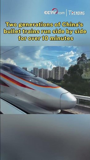 Two generations of China's bullet trains run side by side for over 10 minutes