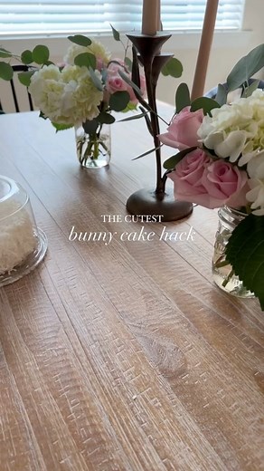 1.4K views | Save this simple hack to make the cutest bunny cake for Easter!!  you’ll need to grab a store bought cake, I went with this cutie coconut cake from Walmart, marshmallows, & pink sanding sugar. Just cut the marshmallow diagonally corner to corner and dip the sticky side into the sanding sugar. Use a tooth pink to secure the marshmallow ears on top of the cake. It’s that simple! #semihomemade #bunnycake #easterbaking #easterbunny | Rachel Dodge | Facebook