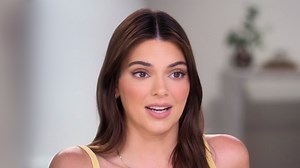 Kendall Jenner barely escapes wardrobe malfunction in black plunging dress