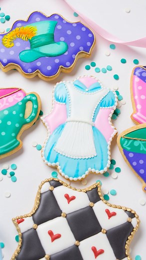 These decorated cookie designs were inspired by the characters of Alice in Wonderland 🫖 The instructions, supply list, and recipes to make these cookies are in the Cookie Art Club! | SweetAmbs
