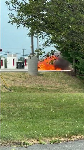 Electric vehicle fire at charging station