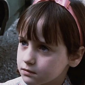 Matilda is a story wrapped in whimsy, but at its heart it’s about a child discovering her own power in a world that constantly underestimates her. It’s the quiet rebellion of a girl who refuses to shrink, even when every adult around her tries to make her feel small. Matilda doesn’t fight back with anger — she fights back with brilliance, kindness, and a mind sharp enough to cut through cruelty. Her world is divided between two forces: the chaos and bitterness of the Wormwoods, and the warmth an
