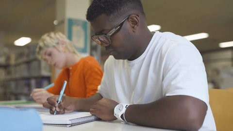 University Students Writing Notes Campus Library Stock Footage Video (100% Royalty-free) 3789222685 | Shutterstock