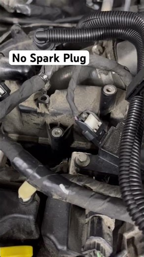 Ford Fusion 1.5 turbo throwing flame with no spark plug? #mechanic #mechanicfail #ford