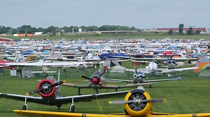 One of the most popular ways to experience EAA AirVenture Oshkosh is by camping in Camp Scholler or setting up your tent under the wing of your own airplane. You won't experience anything else like it! | EAA - The Spirit of Aviation