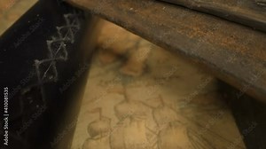 Closer look of the telescope book and glasses on top of the huge map on the table