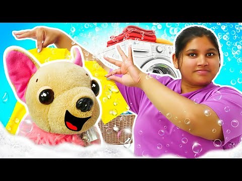 It's time for the laundry! Sorting baby doll's clothes and washing them in a toy washing machine.