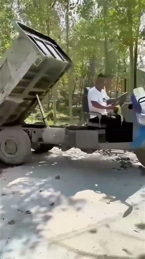 Super cool dump truck appears on dirt road