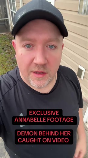 Exclusive footage of Annabelle, known as the most haunted doll in the world, was captured this past year in Lexington, Kentucky at Scarefest—and this chilling 45-second clip reveals at least three unexplained anomalies. As the camera films the infamous haunted doll inside her protective case, it suddenly glitches for no apparent reason, followed by a dark shadow figure appearing inside the glass enclosure that could not have been cast by anyone in the room. Many believe this shadow is the demoni
