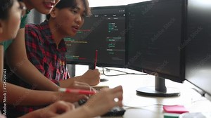 Back end software developer engineer for computer programming working together on debugging writing computing code, solving complex algorithms display on monitor in office. Burgeoning