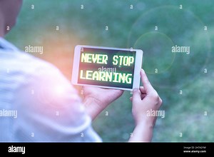 Hand writing sign Never Stop Learning. Business showcase keep on studying gaining new knowledge or materials Voice And Video Calling Capabilities Stock Photo - Alamy