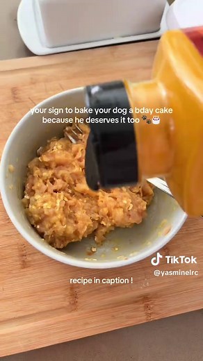 baking my dog’s birthday cake 🎂🐶 he’s officially spoiled 🥰 RECIPE: ingredients • 1 small chicken breast, finely minced (raw) • 1 egg • 1–2 tbsp whole wheat flour • 1–2 tbsp oats • 1–2 tbsp dog-safe purée (pumpkin / sweet potato / apple) • plain yogurt (for frosting) instructions \t1.\tpreheat oven or air fryer (bake mode) to 350°F / 175°C \t2.\tmix raw minced chicken, egg, flour, oats, and purée until combined \t3.\tpress mixture into a small cake mold \t4.\tbake around 30 minutes (until gold