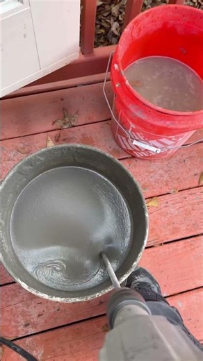 Pouring self leveling compound.