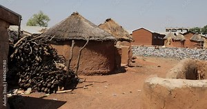 Traditional mud thatch homes Gambaga Ghana pan. Northern region. Rural traditional mud and straw huts and buildings. Poverty economy. African tribal and native homes.