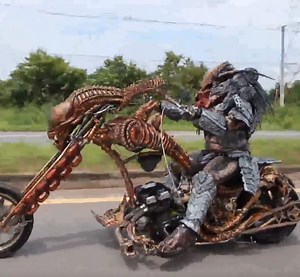 Video of Predator Riding Alien Bike to Work is Too Awesome for Words