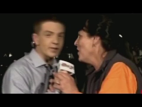 Watch this on-air fight for a mic at a pumpkin fest