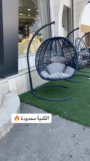 Stylish Hanging Egg Chairs in Outdoor Setting