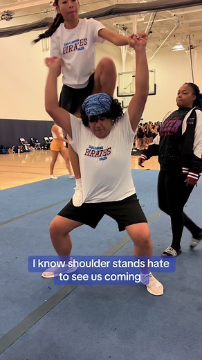 Still havent mastered this but its coming along #slpiratescheer #nikkibona_cheer #cheerislife #coachnikki #coachthings #shoulderstands #cheer #cheercamp #partnerstunts