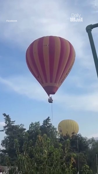 Terrifying moment hot air balloon crashes near Mexican pyramids injuring 12