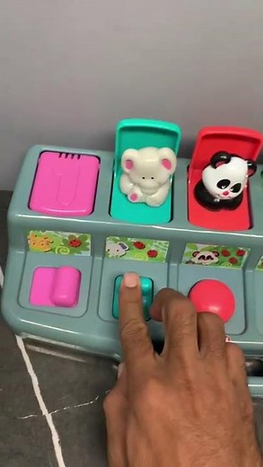 Playskool Busy Poppin' Pals Pop-up Activity Toy.