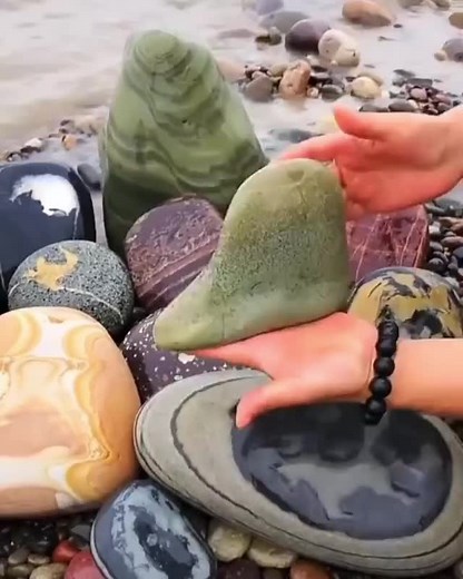 Exploring Beautiful Smooth Stones on a Pebbled Beach