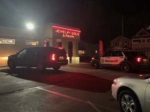 Huntington Police investigating armed robbery at pawn shop