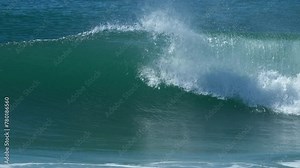 Ocean wave breaks on the shore in Brazil