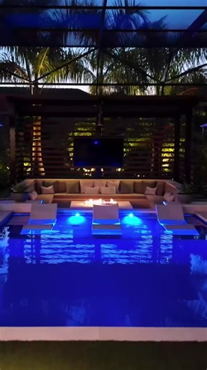 Who are you sitting around this fire pit with? #RyanHughesDesign #OutdoorLivingRedefined #luxuryhomes