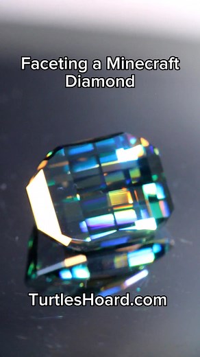 I am learning to facet gems and for stone 14 I tried to make a pixel cut minecraft diamond (though cut out of blue moissanite). If you'd like to buy the stone it is up in my etsy shop at the link in my bio. This material was trimmed from a rejected puck of industrial silicon carbide grown for use in chips. Unfortunately (for them) they let some atmospheric nitrogen leak in which gave it a dark green rind, and might also be responsible for the very odd blue/yellow dichroic hue. Silicon carbide, a