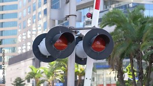 Railroad Crossing Train Sign and flashing lights in 4K Slow motion 60fps