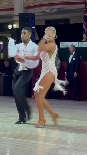 Blackpool Dance Festival: The world's first and most famous annual 8-day ballroom dance competition of international significance, held in the Empress Ballroom at the Winter Gardens, Blackpool, England, since 1920. If you have yet to attend, it's a must-have experience. During my first time at Blackpool, I started with Singles and championship rounds on Monday & Tuesday. Then, on Wednesday, we performed a Mambo as the first American Rhythm showcase at the Grand Gala Dinner. This week was filled