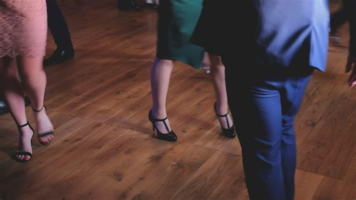 Close up of people dancing in a busy dance hall - Free Stock Video