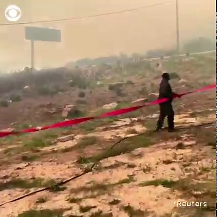 Residents in Cape Town, South Africa are being evacuated as the sky turns orange amid the ongoing Table Mountain Fire. | CBS News