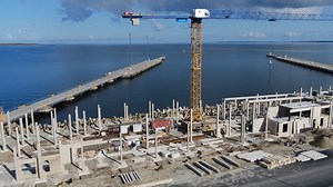 See the process of the construction of Tallinn's new cruise terminal. All the foundations of the terminal building have been cast and the installation of building's frame posts has begun. For the promenade, the rubble base is being laid and the foundation is being built, as well as the setting up of landforms in compliance with the landscape architectural solution. | Port of Tallinn / Tallinna Sadam