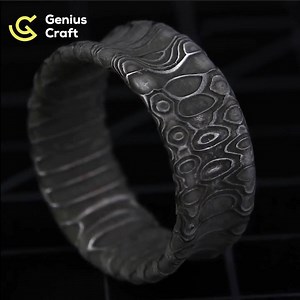 Making a reptilian Damascus steel ring | Genius Craft