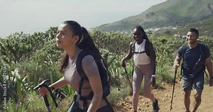 Trekking, nature fitness and people walk on morning journey, cardio exercise or mountain climbing in South Africa. Backpacking, adventure or group hiking for team workout, sports training or activity