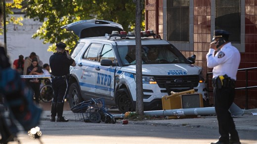 Crash involving NYPD vehicle hurts 10; two people critically injured
