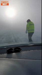 18K views · 159 reactions | Xinjiang traffic police officer braves blizzard to guide cars Recently, amidst a heavy #blizzard in Altay, Northwest China's #Xinjiang Uygur Autonomous Region, a traffic #policeofficer braved the wind and snow to guide the way for cars. | WE ARE CHINA | Facebook