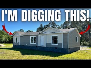 SWEET little slice of heaven right here with this new double wide mobile home!